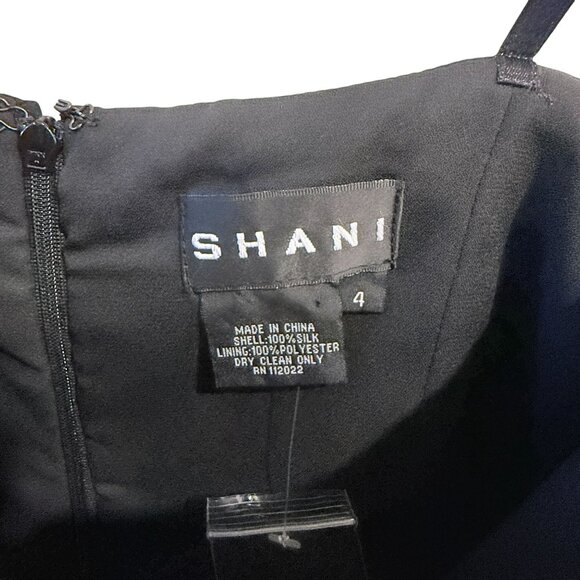 Shani Black Strapless Cocktail Dress Tuxedo Style Pleated White Bib Silk Size 4 - Picture 3 of 9